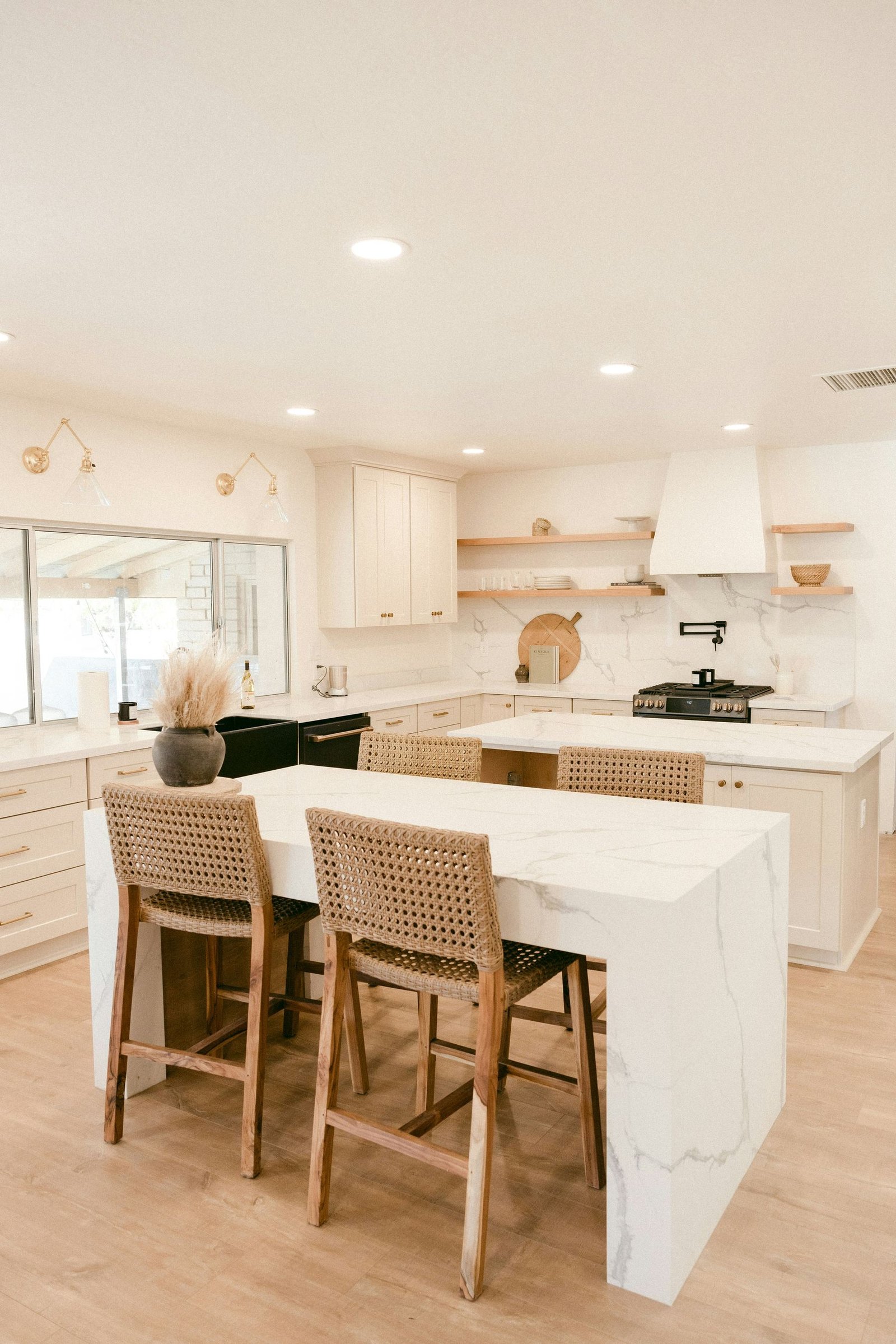 Custom kitchen island with stone benchtop and soft-close cabinetry